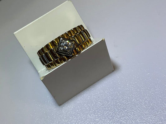 Goldring mit Brillant im Rolexmuster